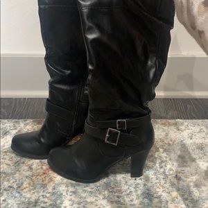 Black buckle high heeled boots
